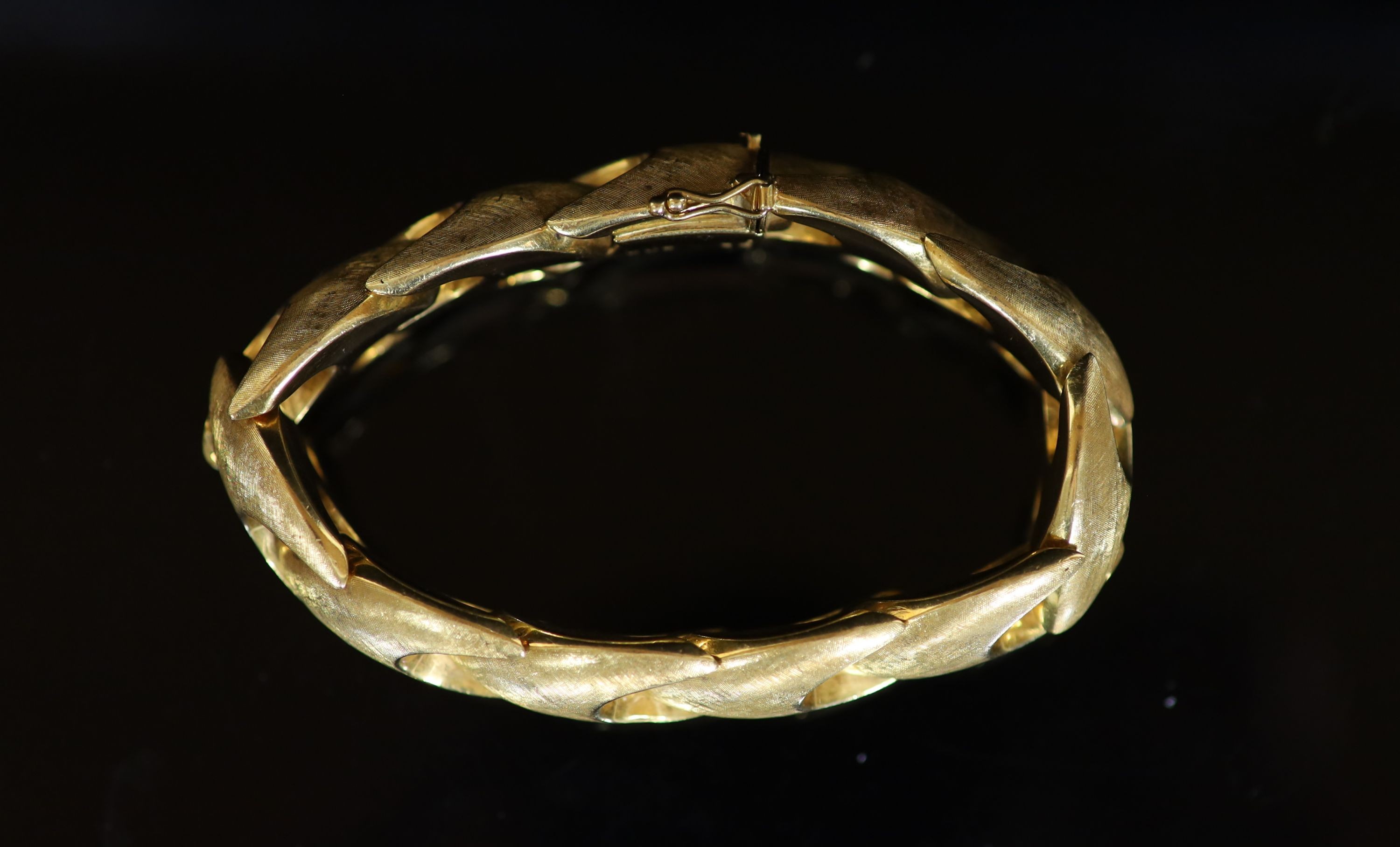 A 1970's brushed 18ct gold bracelet, 18.5cm, 57.3 grams.